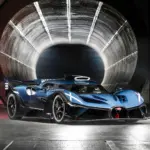Bugatti Bolide in türkis-blauem Carbon mit schwarzem Akzenten vor Windkanal-Öffnung