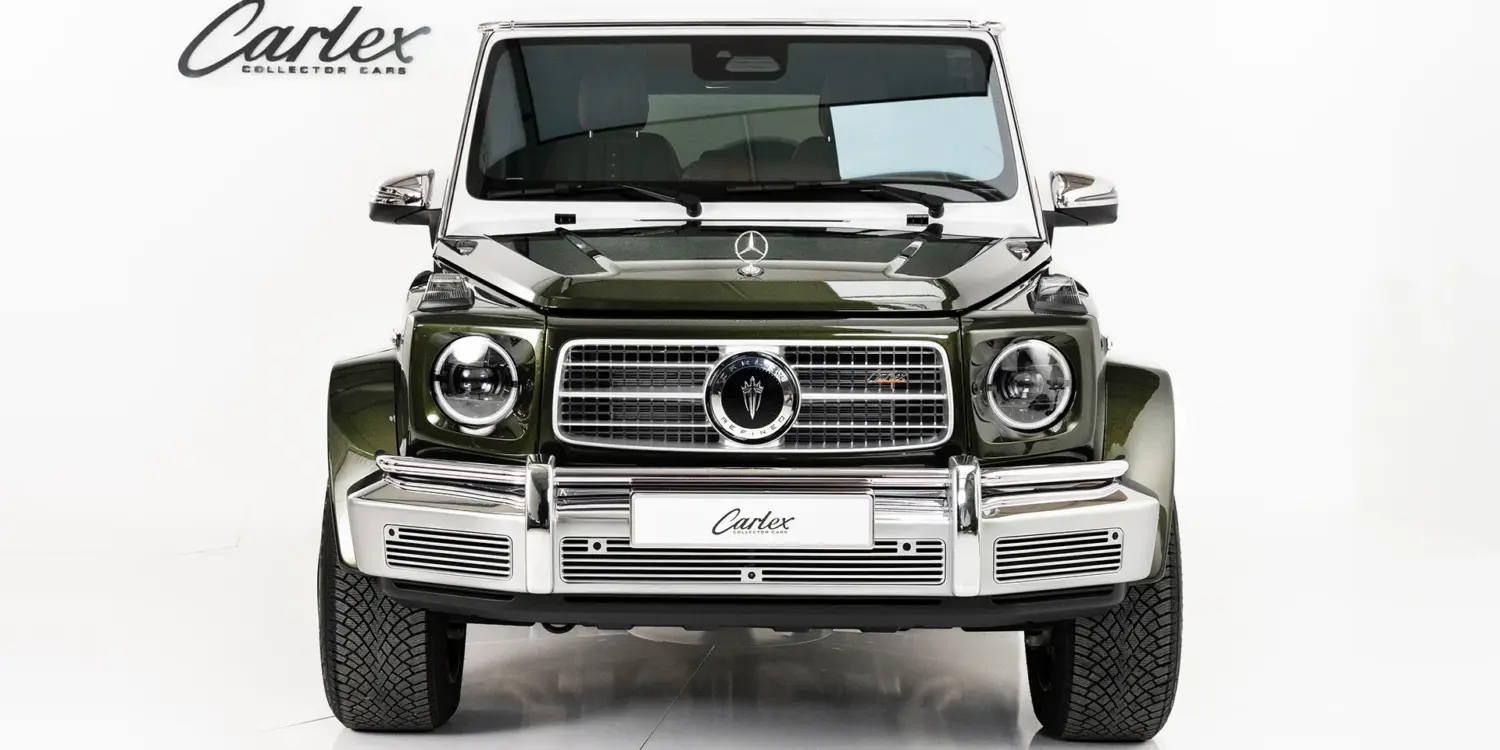 Carlex G63 Fern Vintage in smaragdgrün mit breiter Karosserie, von vorne fotografiert.