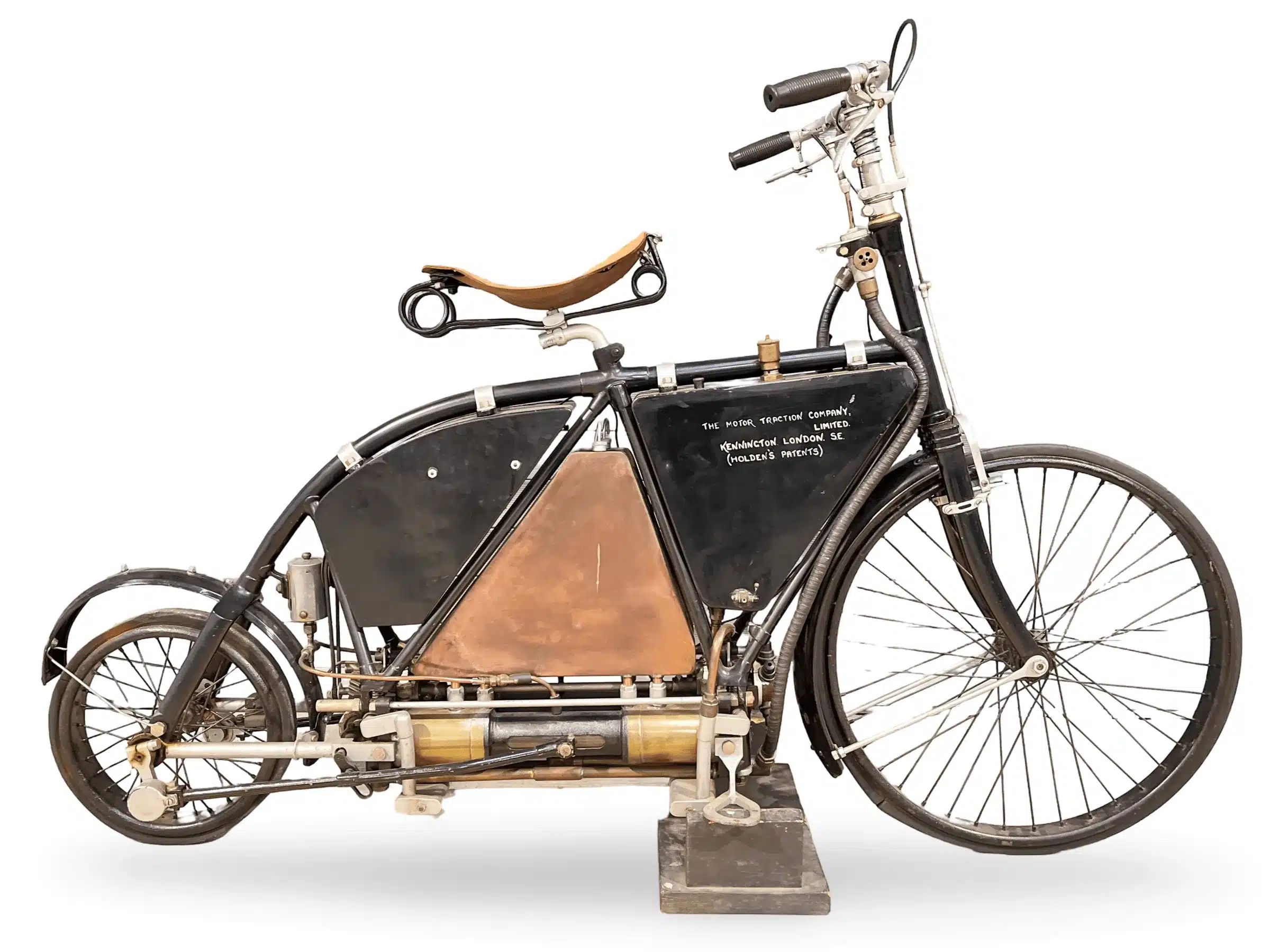 Holden-Motor Bicycle von 1898 mit sichtbarem Vierzylinder-Boxermotor und charakteristischem Fahrradrahmen, seitlich fotografiert.