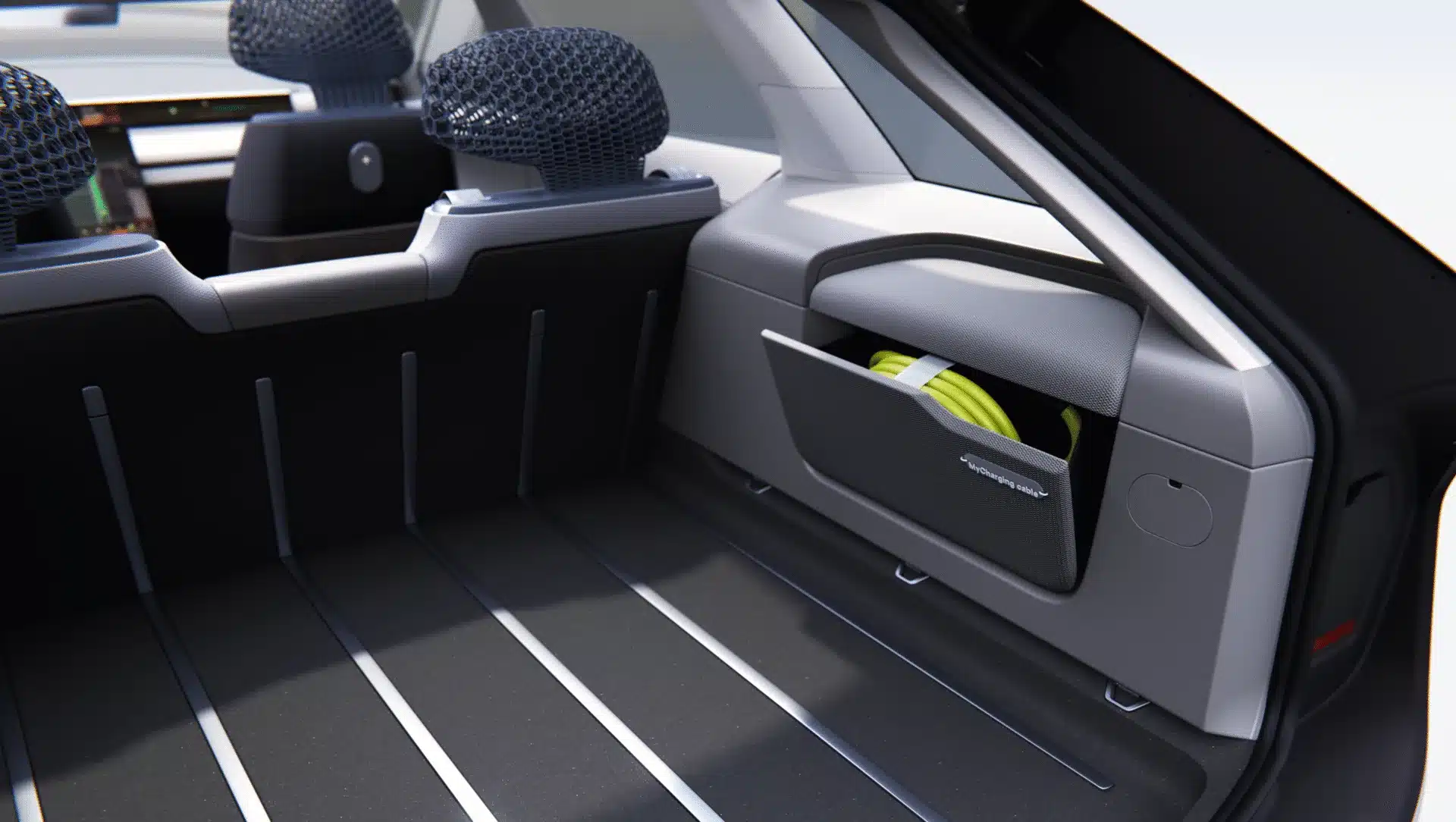 Laderaum eines Škoda Vision O mit moderner Innenausstattung und 3D-gedruckten Kopfstützen.