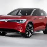 Rotes Volkswagen ID. ROOMZZ Elektro-SUV-Konzept mit markanten LED-Leuchten und futuristischem Design