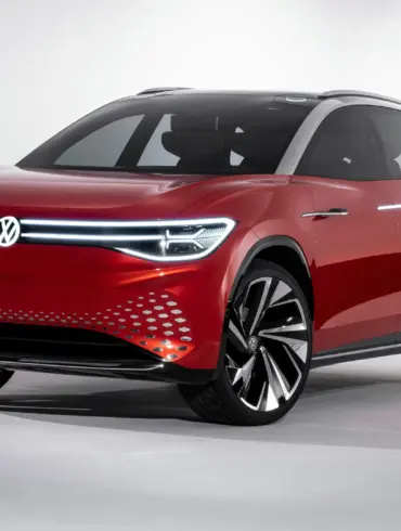 Rotes Volkswagen ID. ROOMZZ Elektro-SUV-Konzept mit markanten LED-Leuchten und futuristischem Design