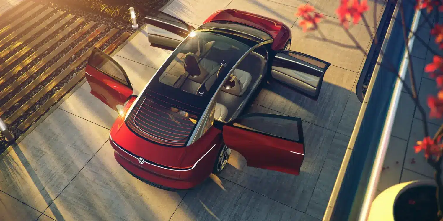 Volkswagen ID. VIZZION als Oberklasse-Elektro-Limousine mit offenem Panoramadach und allen Türen geöffnet, Vogelperspektive.