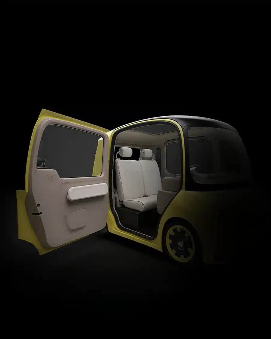 Innenraum eines gelben Elektro-Microcars von ASTRAUX mit offener Tür und zwei Sitzplätzen