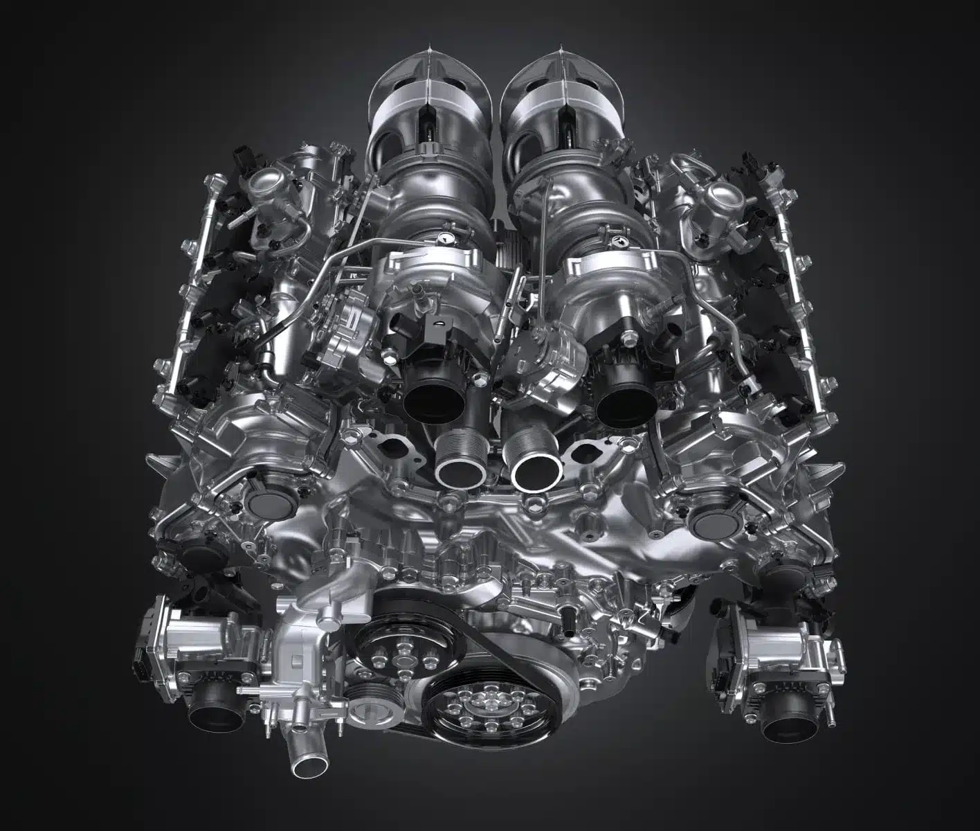 Der neu entwickelte 4,0-Liter-V8-Biturbo-Hybridmotor des Toyota GR GT vor schwarzem Hintergrund.