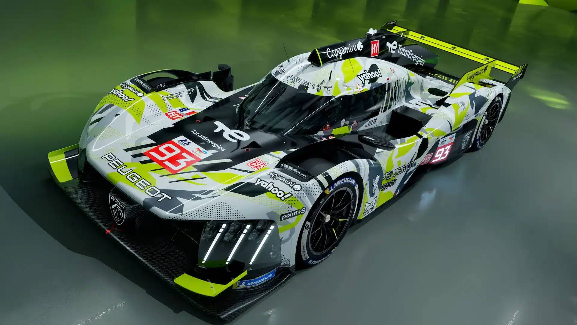 Peugeot 9X8 Hybrid-Hypercar mit auffälliger Art-Car-Lackierung und Lichtsignatur, präsentiert für das 24-Stunden-Rennen von Le Mans