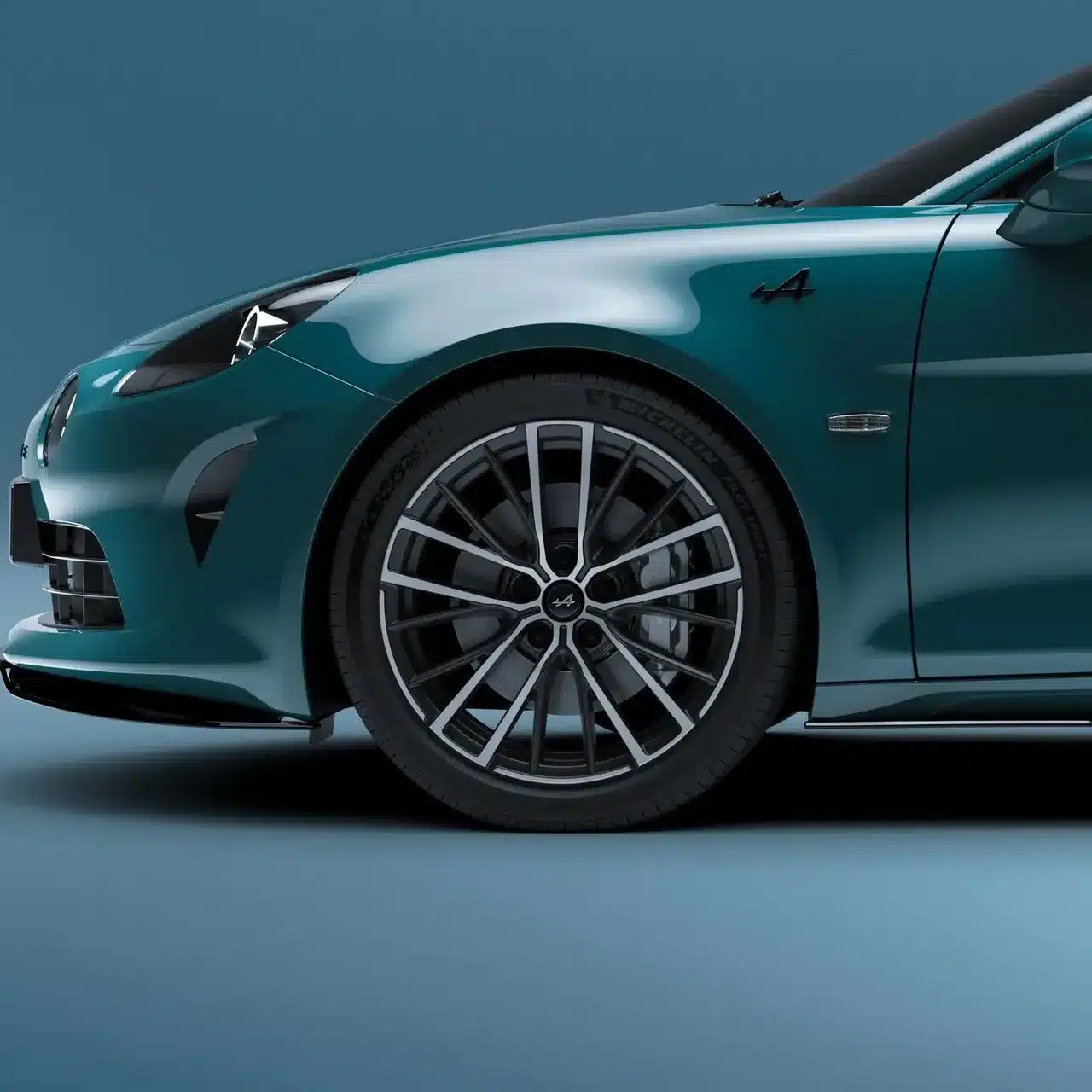 Detailansicht der Seitenpartie einer Alpine A110 GTS mit auffälligen Leichtmetallfelgen in Thunder Grey.