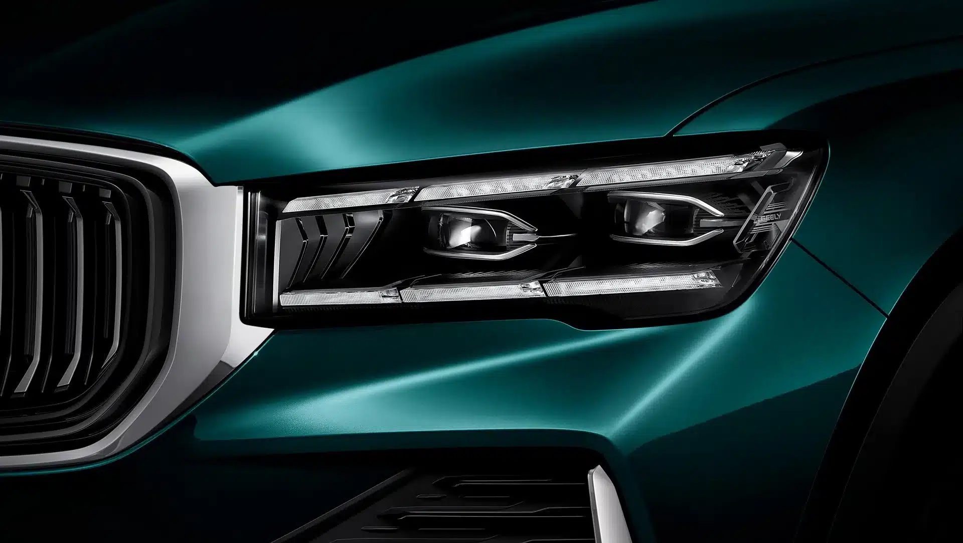 Frontansicht eines LED-Scheinwerfers und des Kühlergrills am Geely Monjaro SUV