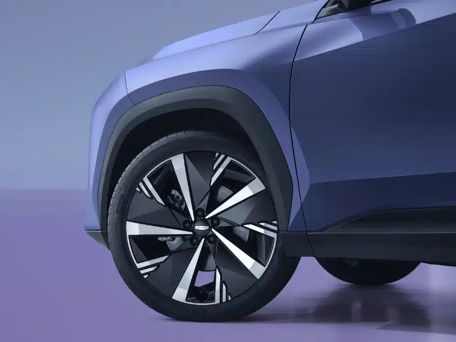Nahaufnahme eines Vorderrads mit 20-Zoll-Leichtmetallfelge am Geely Starray in Silber und Schwarz
