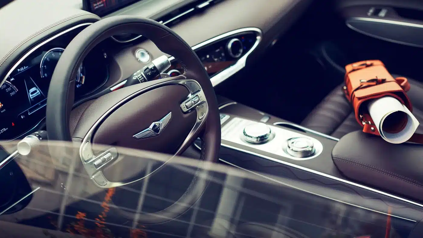 Luxuriöser Innenraum und Cockpit des Genesis GV70 mit Nappaledersitzen und moderner Technik.