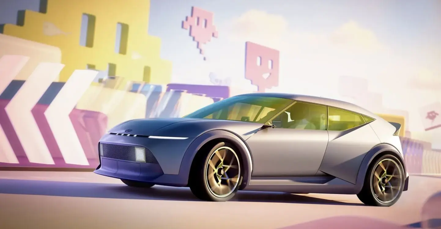 Hyundai Concept THREE Aero Hatch Elektroauto Studie Seitenansicht vor bunter Kulisse