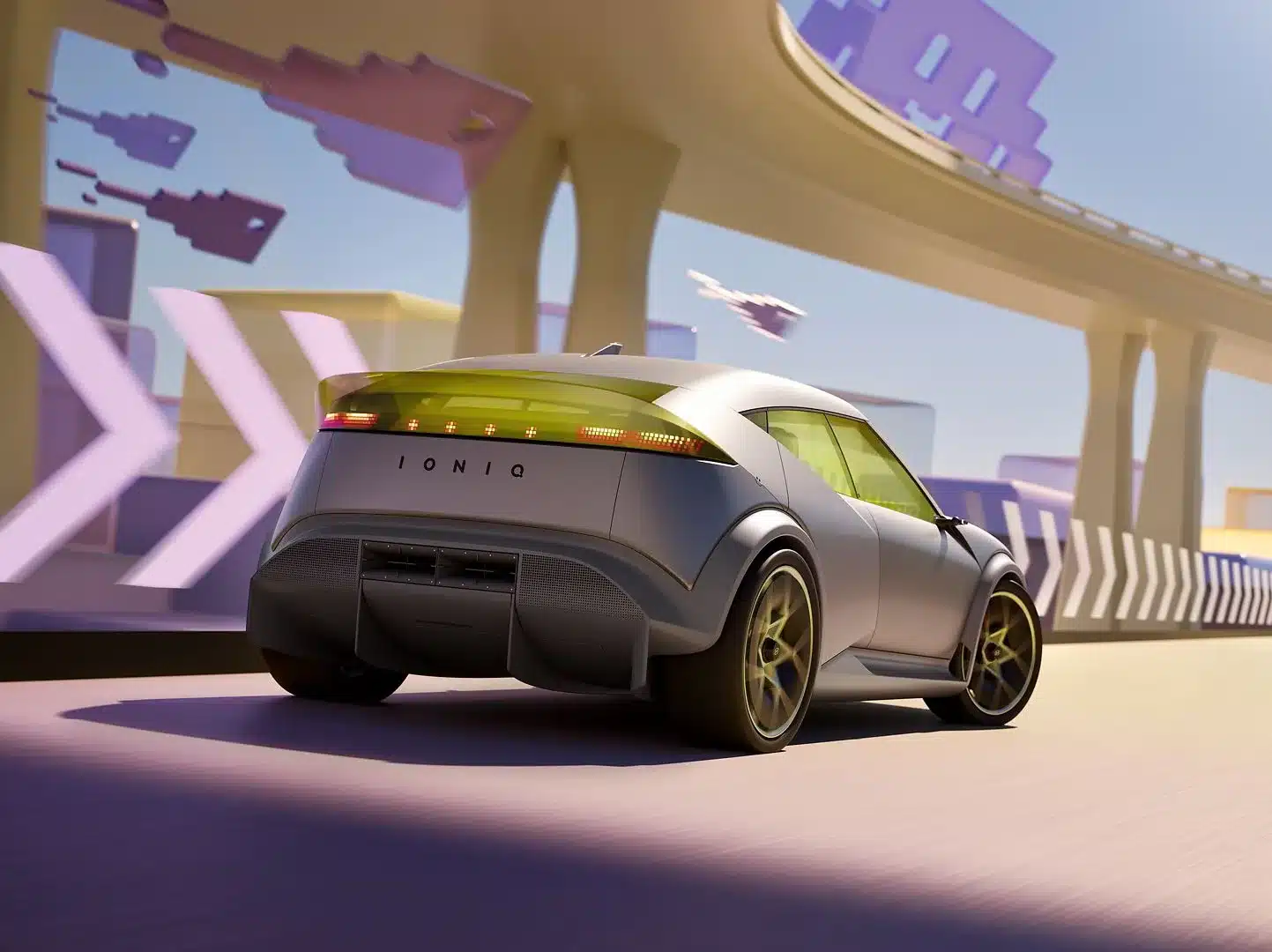 Heckansicht des Hyundai Concept THREE, einem kompakten Elektroauto-Konzept von Hyundai, auf einer futuristischen Straße