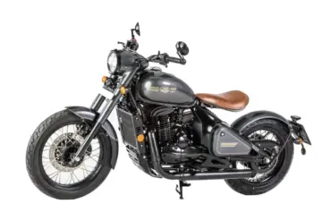 Jawa 350 CL Perak Motorrad in seitlicher Ansicht mit braunem Einzelsitz.