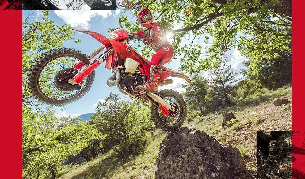 GASGAS EC 300 2026 Enduro-Motorrad springt über Fels im Wald bei Sonnenschein