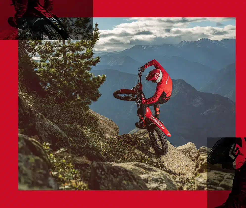 GASGAS TXT Racing 280 fährt auf Fels im Gebirge, Fahrer in roter Kleidung, Trial-Motorrad