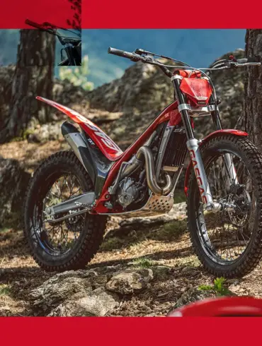 GASGAS TXT Racing 280 Motorrad im Wald auf felsigem Untergrund