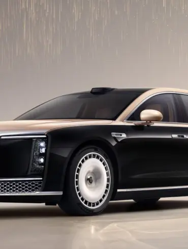 Zunjie S800 Limousine in Schwarz-Gold, seitliche Frontansicht im Studio