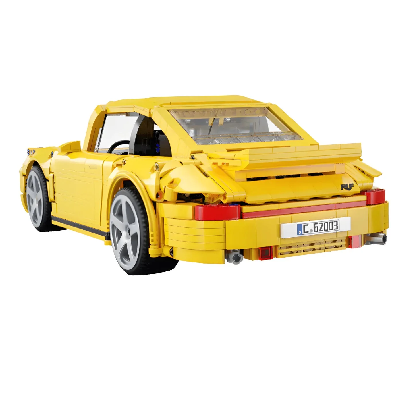 Rückansicht des gelben RUF Yellowbird Klemmbausteinmodells mit sichtbarem Spoiler und detaillierter Karosserie
