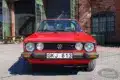 VW Golf Cabriolet 1.8 GLI in Marsrot von vorn, Oldtimer, guter Zustand, aufgenommen bei Bilweb Auctions.