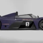 Seitenansicht des Revolution HyperSport Track-Cars in dunkler Lackierung mit auffälligem Heckflügel und niedriger Fahrhöhe.