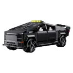 Klemmbaustein-Modell eines kantigen, schwarzen Cyber Utility Trucks mit sichtbaren technischen Details