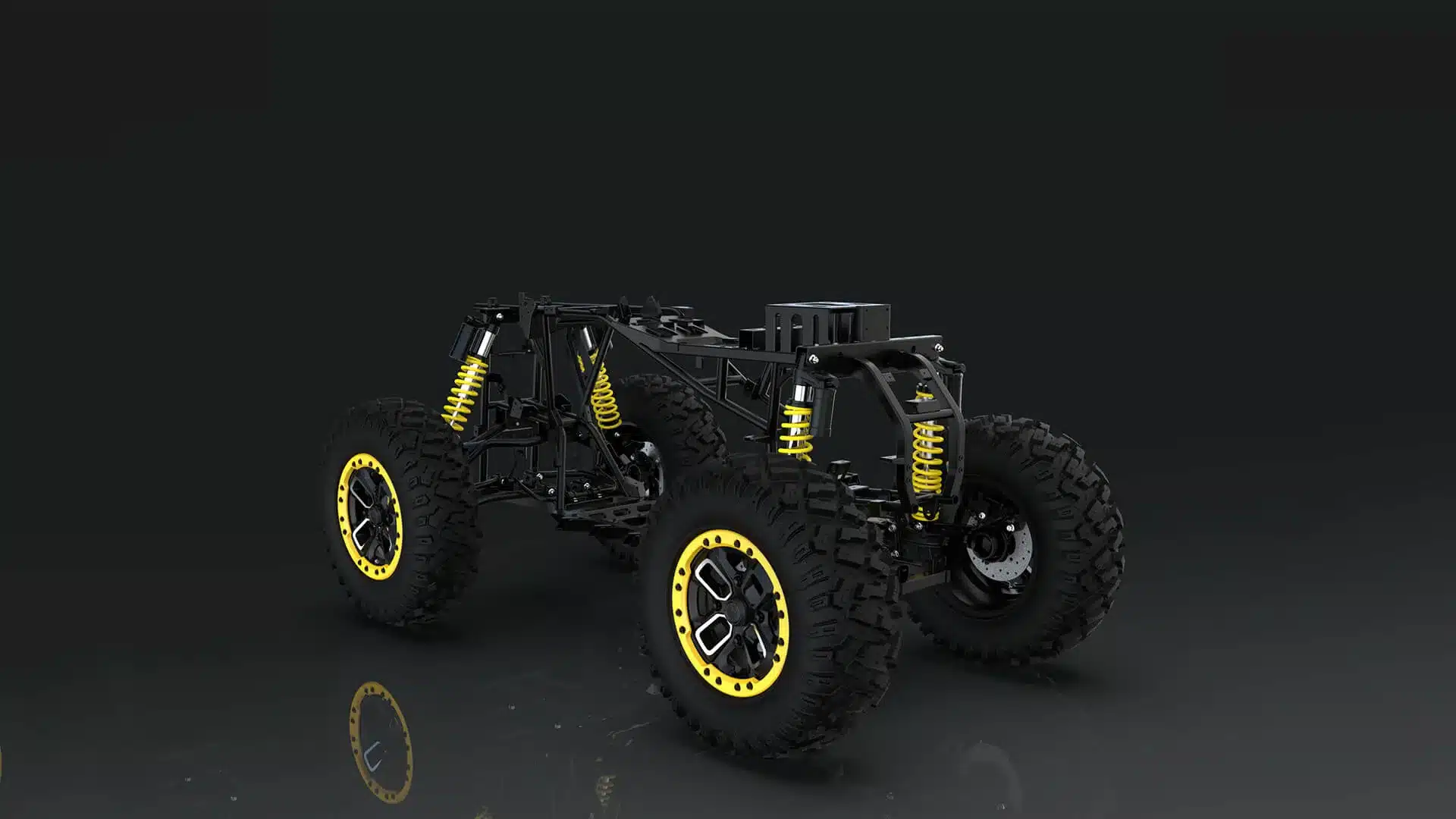Offenes Fahrgestell eines Offroad-Fahrzeugs mit großen Reifen und gelben Stoßdämpfern.