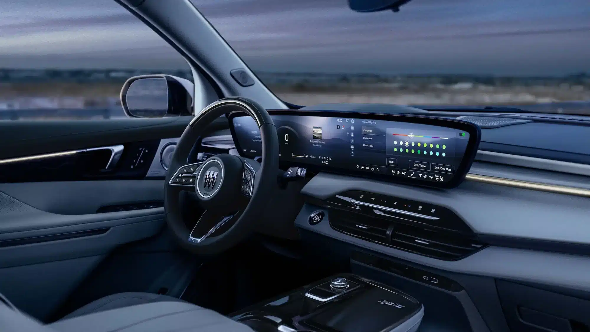 Innenraum des 2026 Buick Enclave mit breitem Touchscreen und Lenkrad.