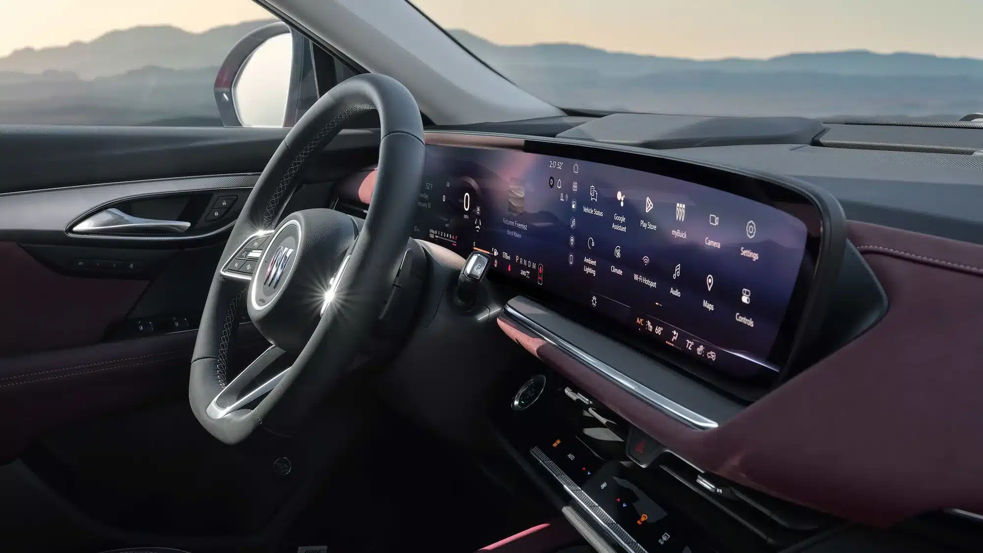 Innenraum des Buick Envision 2026 mit Lenkrad und großem digitalen Display